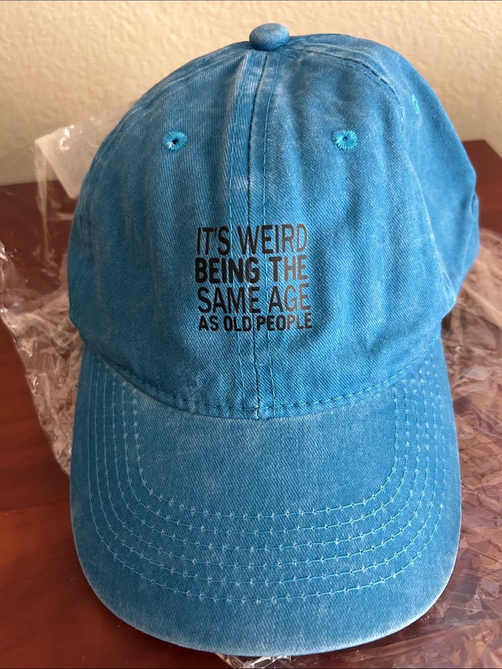 “IT’S WEIRD BEING THE SAME AGE AS OLD PEOPLE” Hat